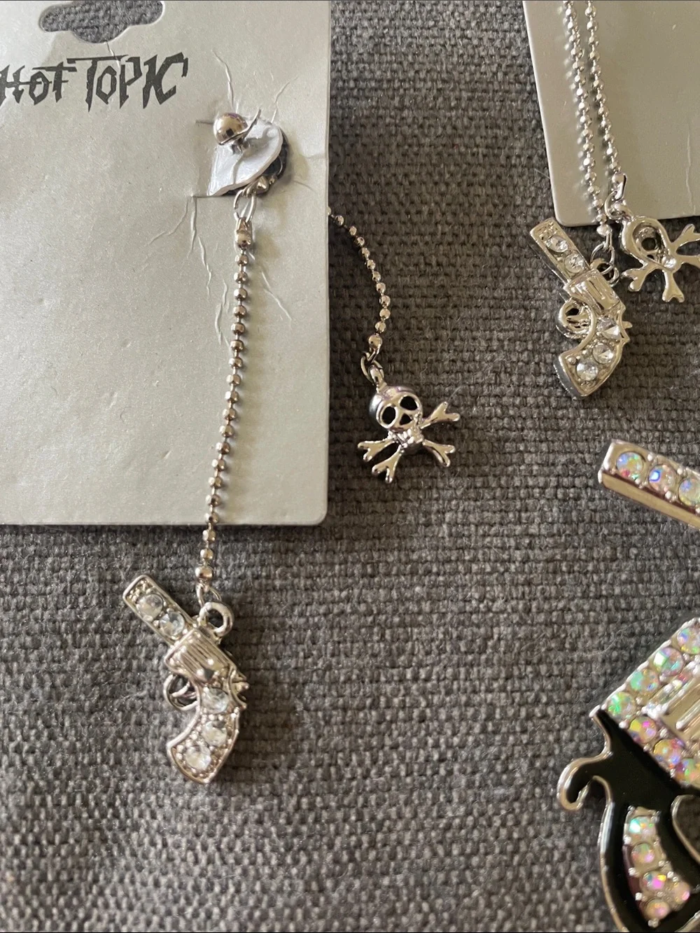Hot Topic Silver Rhinestone Crossed Gun Pendant and Dangle Earring Set